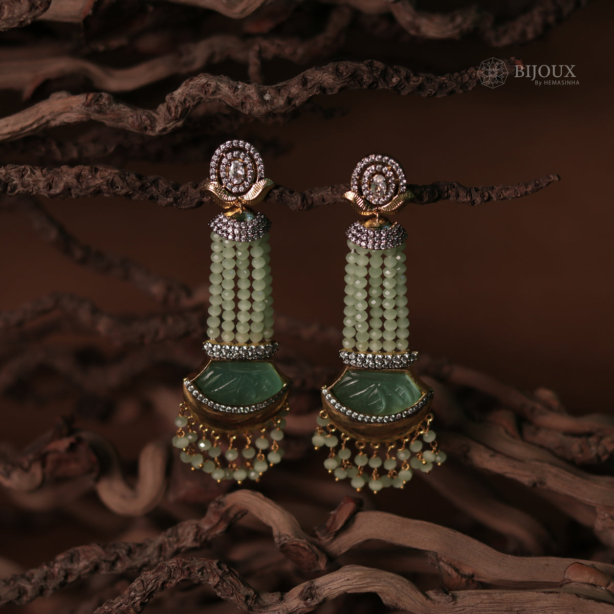 CRYSTAL ELEGANCE HANDMADE GOLD TONED DROPS WITH CARVING STONE ER91