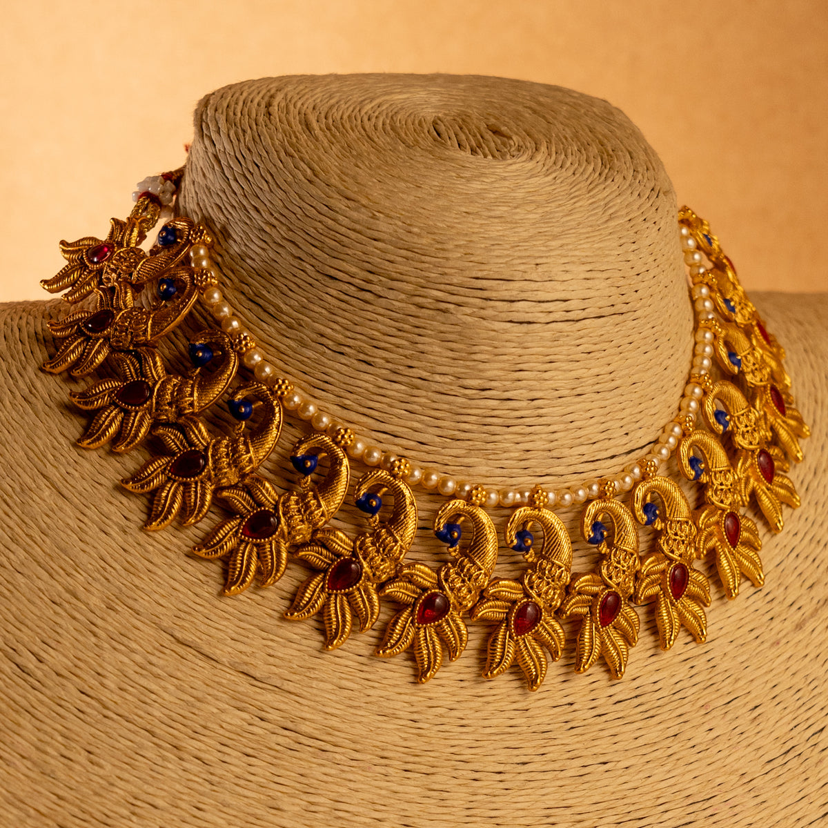 VARNA PEACOCK GOLD TONED ANTIQUE FINISH NECKLACE WITH EARRINGS NL179