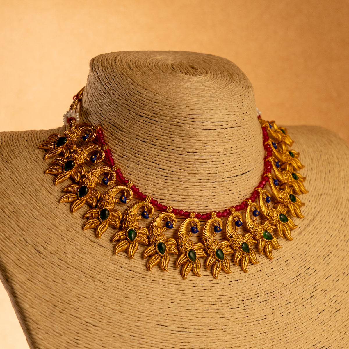 VARNA PEACOCK GOLD TONED ANTIQUE FINISH NECKLACE WITH EARRINGS NL179