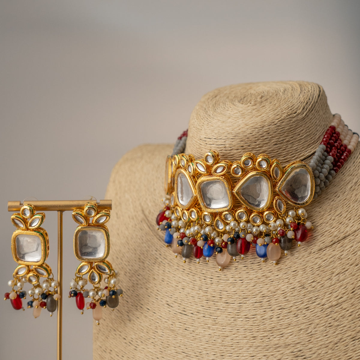 MOI FAUX KUNDAN AND BEADS HANDMADE GOLD TONED CHOKER WITH EARRINGS CH410