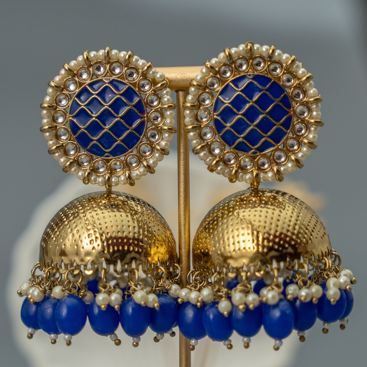 RIKINI GOLD TONED JHUMKAS ER392