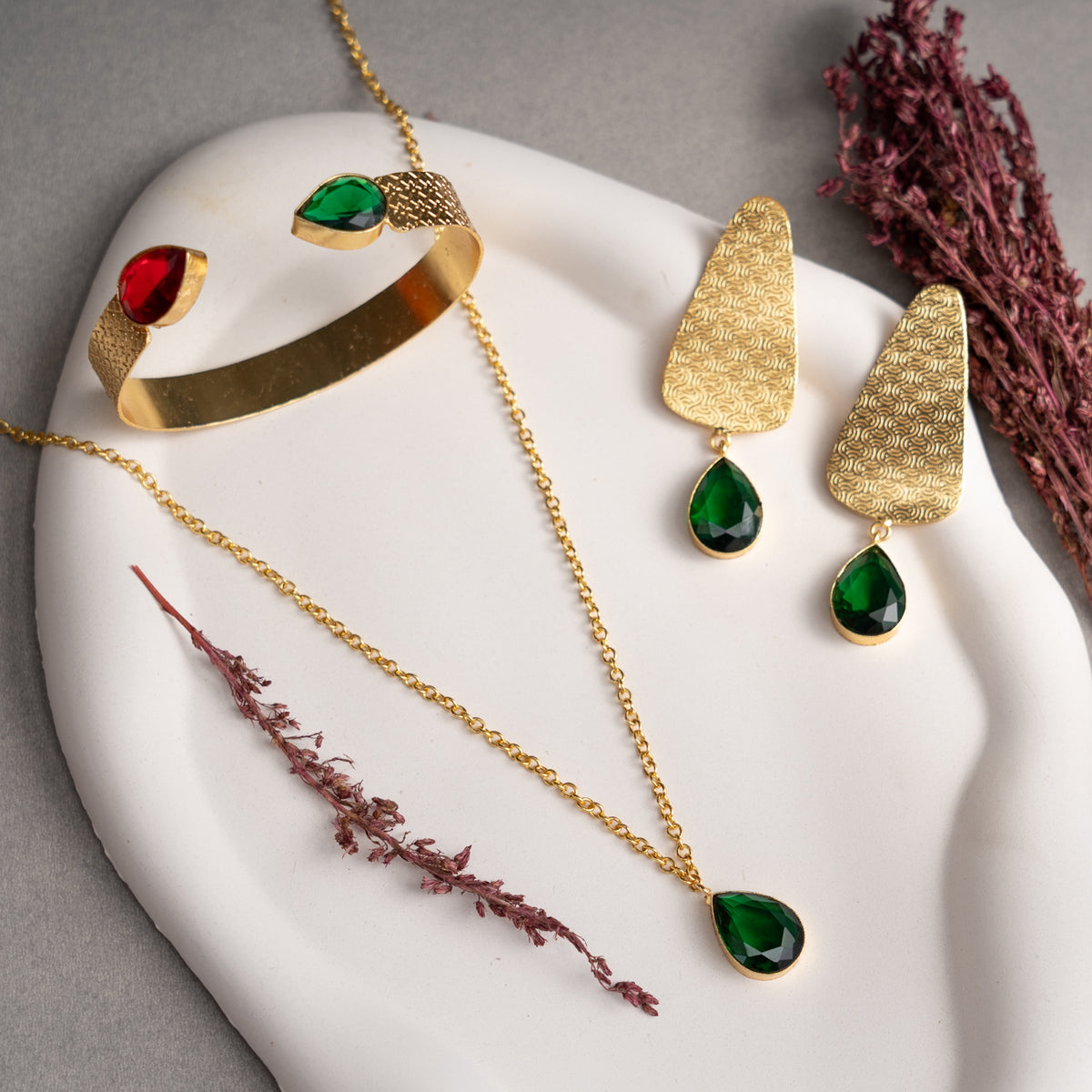 RUBY GOLD TONED HANDMADE HAND HAMMERED NECKLAC EARRINGS AND KADA OF18