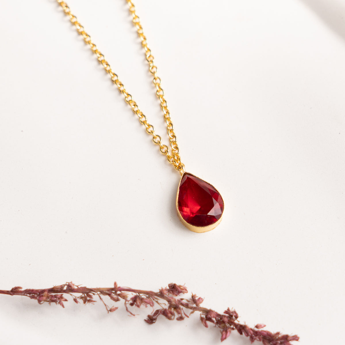 RUBY GOLD TONED HANDMADE HAND HAMMERED NECKLAC EARRINGS AND KADA OF18