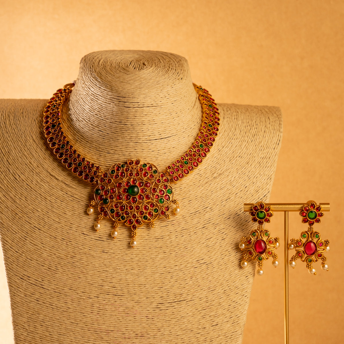 KALYANI GOLD TONED ANTIQUE FINISH NECKLACE WITH EARRINGS NL231