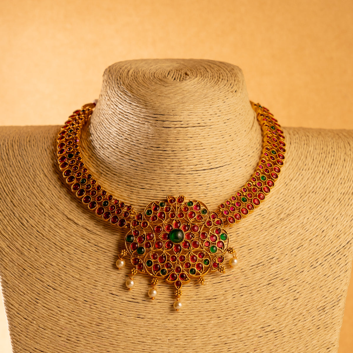 KALYANI GOLD TONED ANTIQUE FINISH NECKLACE WITH EARRINGS NL231