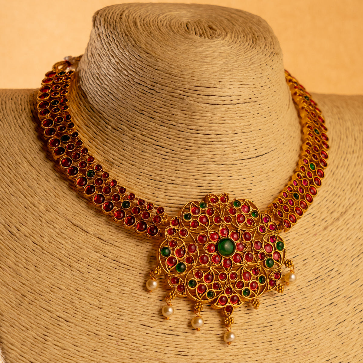 KALYANI GOLD TONED ANTIQUE FINISH NECKLACE WITH EARRINGS NL231