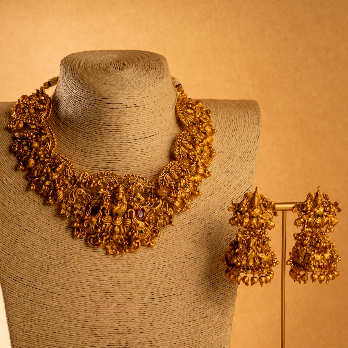 MANGAI GOLD TONED ANTIQUE FINISH TEMPLE NECKLACE WITH EARRINGS NL182