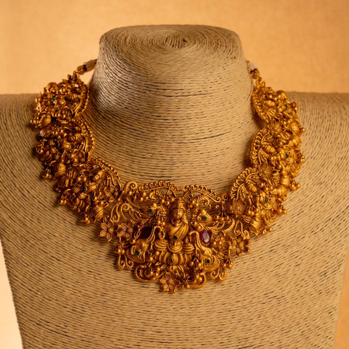 MANGAI GOLD TONED ANTIQUE FINISH TEMPLE NECKLACE WITH EARRINGS NL182