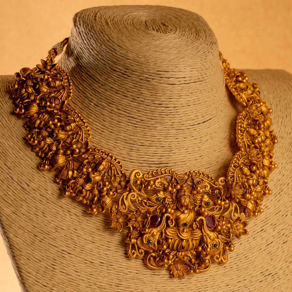 MANGAI GOLD TONED ANTIQUE FINISH TEMPLE NECKLACE WITH EARRINGS NL182