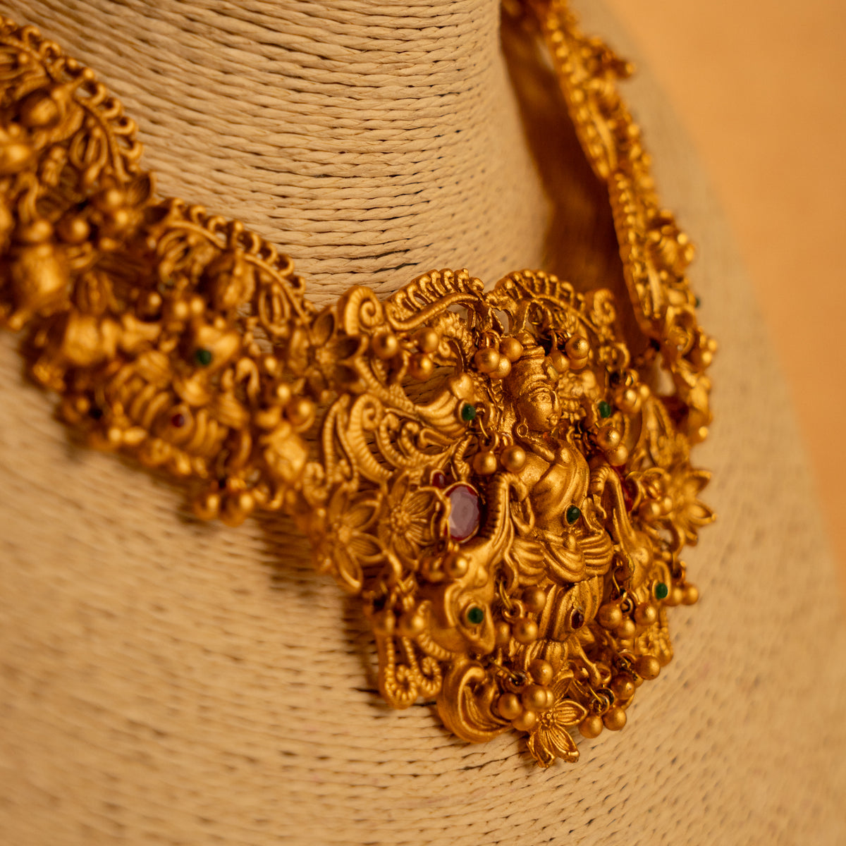 MANGAI GOLD TONED ANTIQUE FINISH TEMPLE NECKLACE WITH EARRINGS NL182