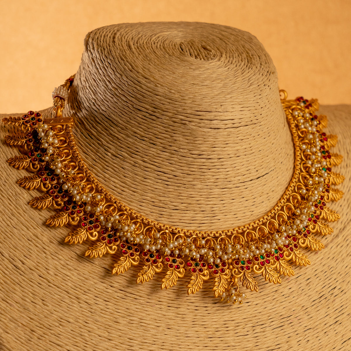 VEDA GOLD TONED ANTIQUE FINISH NECKLACE WITH EARRINGS NL180