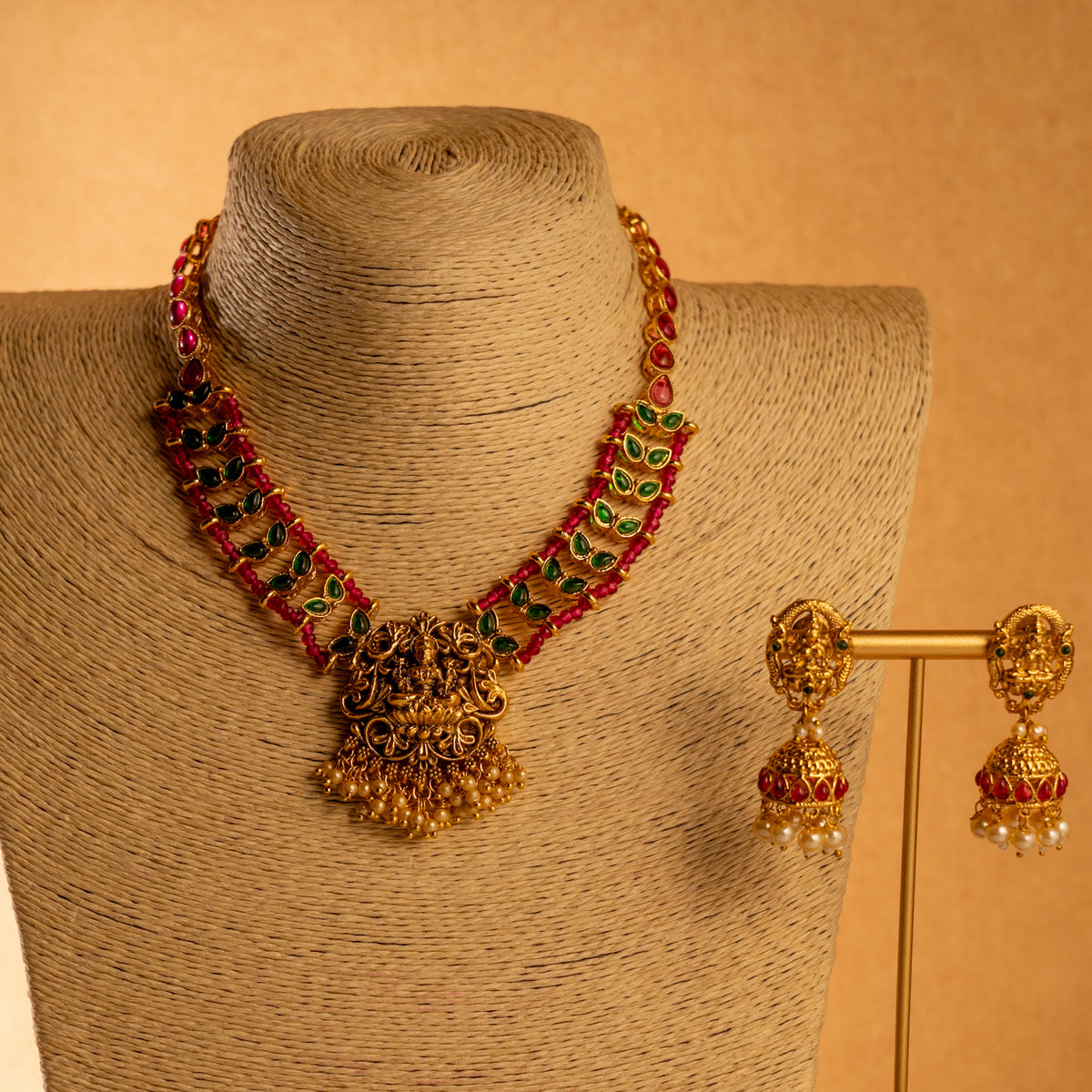 LAKSHMI GOLD TONED ANTIQUE FINISH TEMPLE NECKLACE WITH EARRINGS NL185