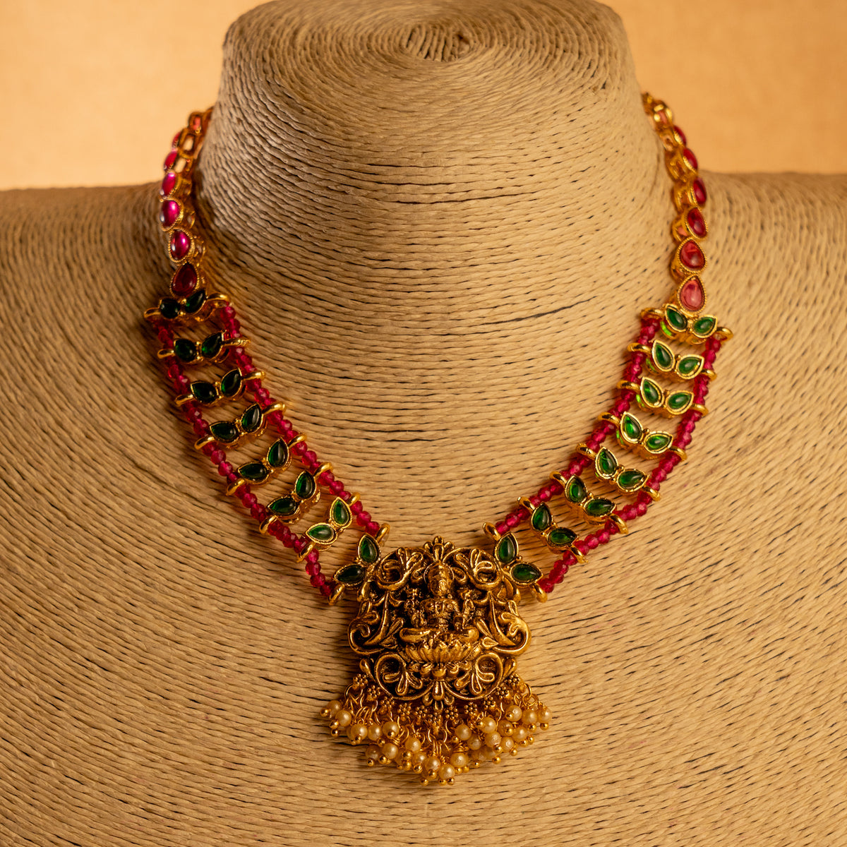 LAKSHMI GOLD TONED ANTIQUE FINISH TEMPLE NECKLACE WITH EARRINGS NL185