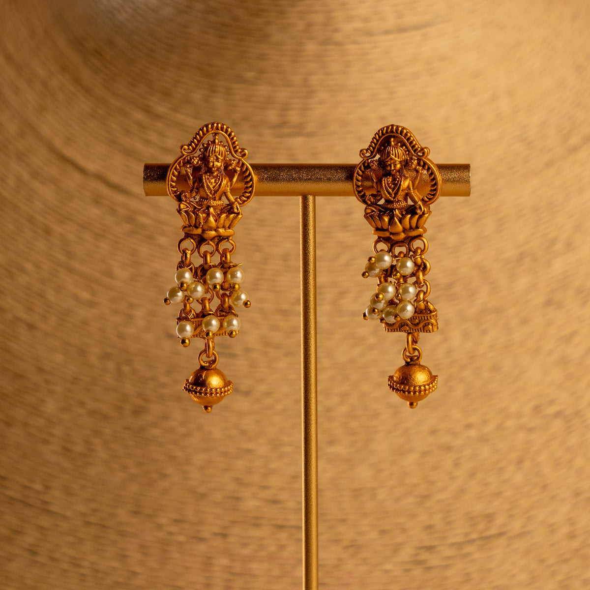 NIRANJANA GOLD TONED ANTIQUE FINISH TEMPLE NECKLACE WITH EARRINGS NL189