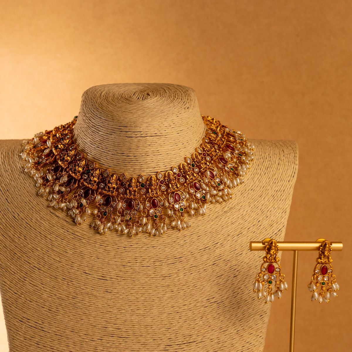 VARAHIGOLD TONED ANTIQUE FINISH TEMPLE NECKLACE WITH EARRINGS NL178