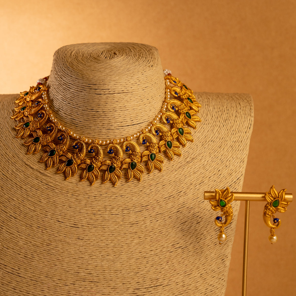 VARNA PEACOCK GOLD TONED ANTIQUE FINISH NECKLACE WITH EARRINGS NL179