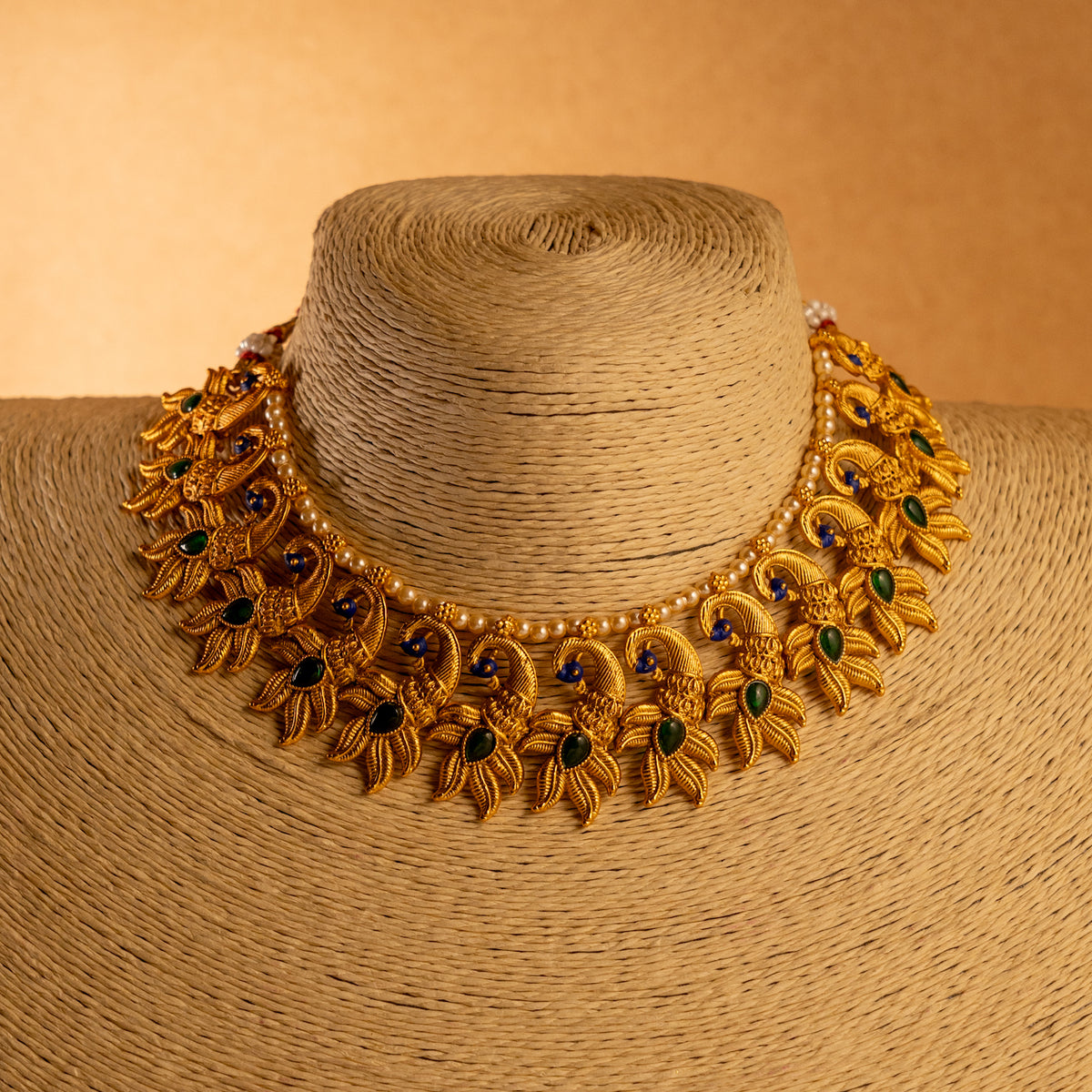 VARNA PEACOCK GOLD TONED ANTIQUE FINISH NECKLACE WITH EARRINGS NL179