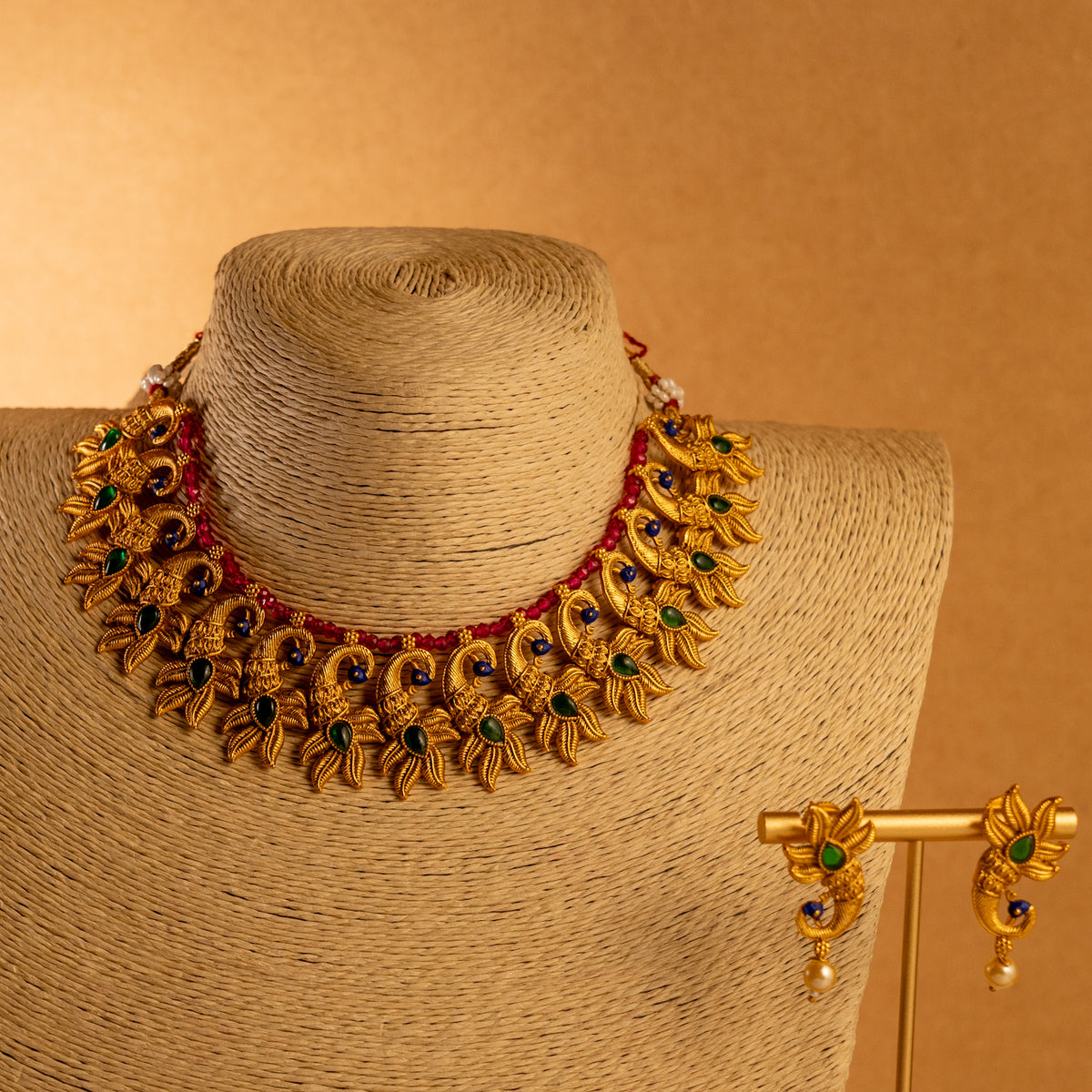 VARNA PEACOCK GOLD TONED ANTIQUE FINISH NECKLACE WITH EARRINGS NL179