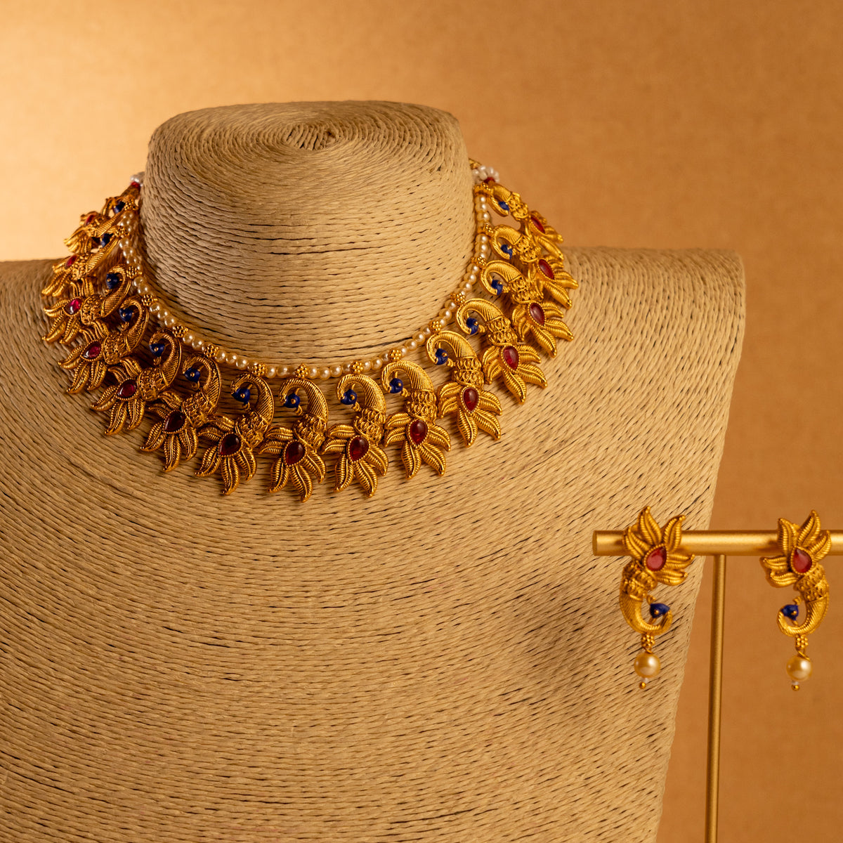 VARNA PEACOCK GOLD TONED ANTIQUE FINISH NECKLACE WITH EARRINGS NL179