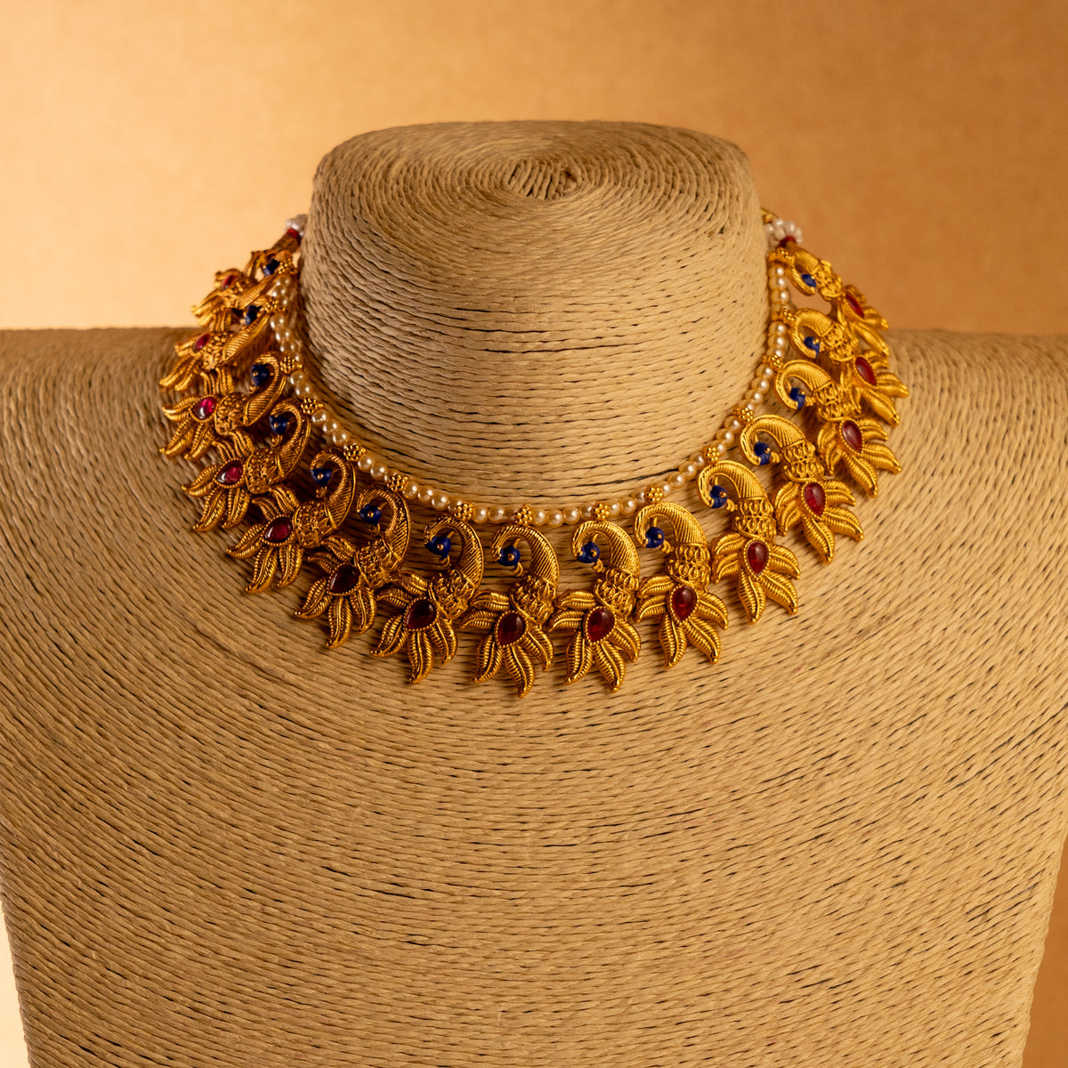 VARNA PEACOCK GOLD TONED ANTIQUE FINISH NECKLACE WITH EARRINGS NL179