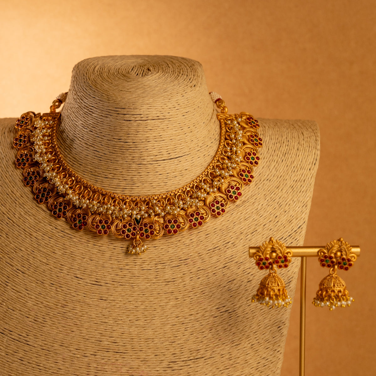 VANDHANA GOLD TONED ANTIQUE FINISH NECKLACE WITH EARRINGS NL177