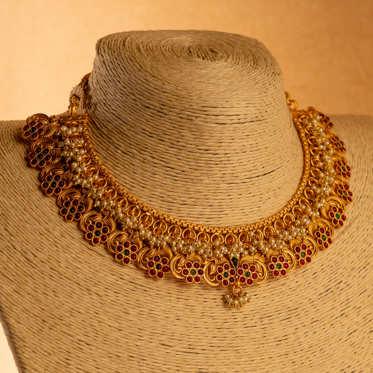 VANDHANA GOLD TONED ANTIQUE FINISH NECKLACE WITH EARRINGS NL177