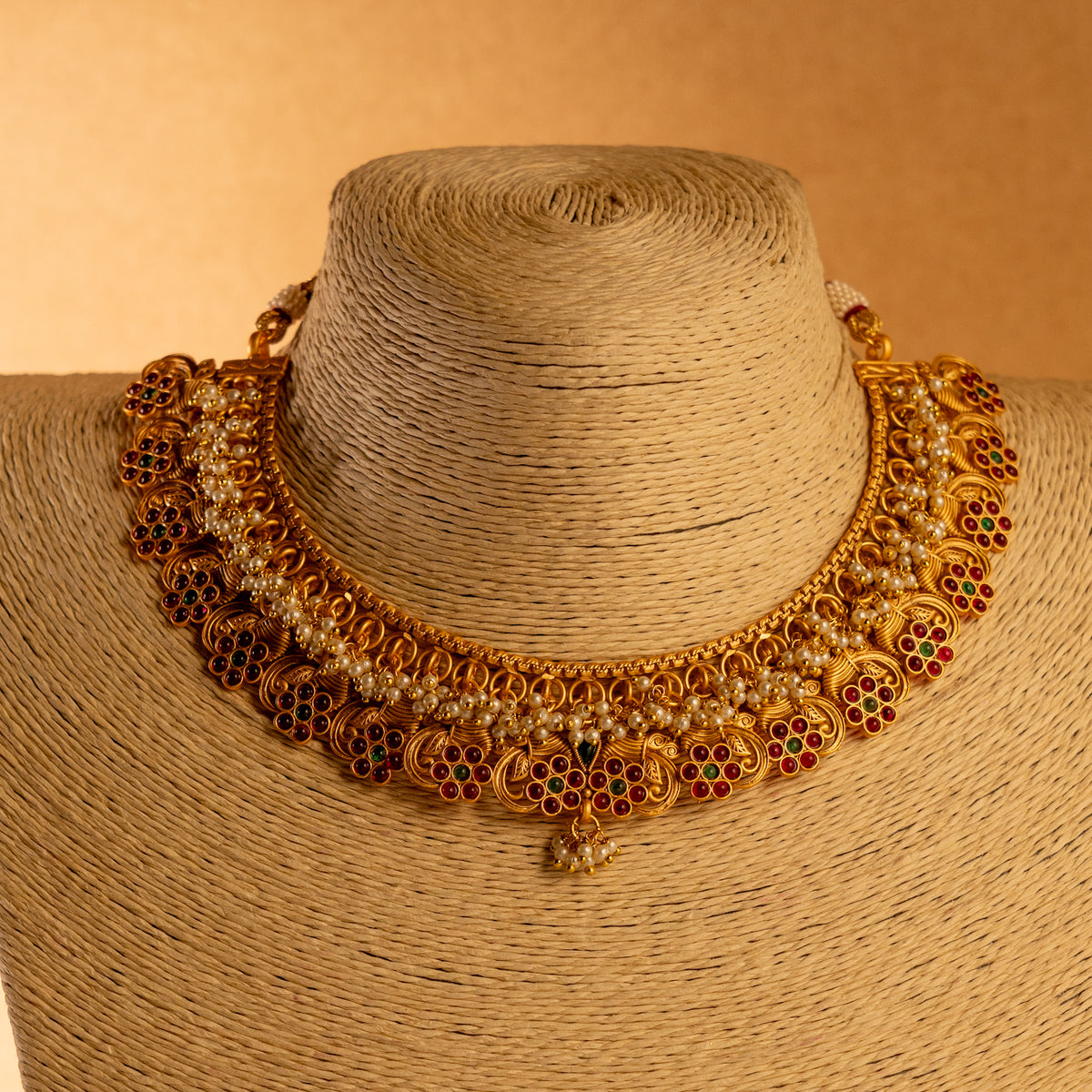 VANDHANA GOLD TONED ANTIQUE FINISH NECKLACE WITH EARRINGS NL177