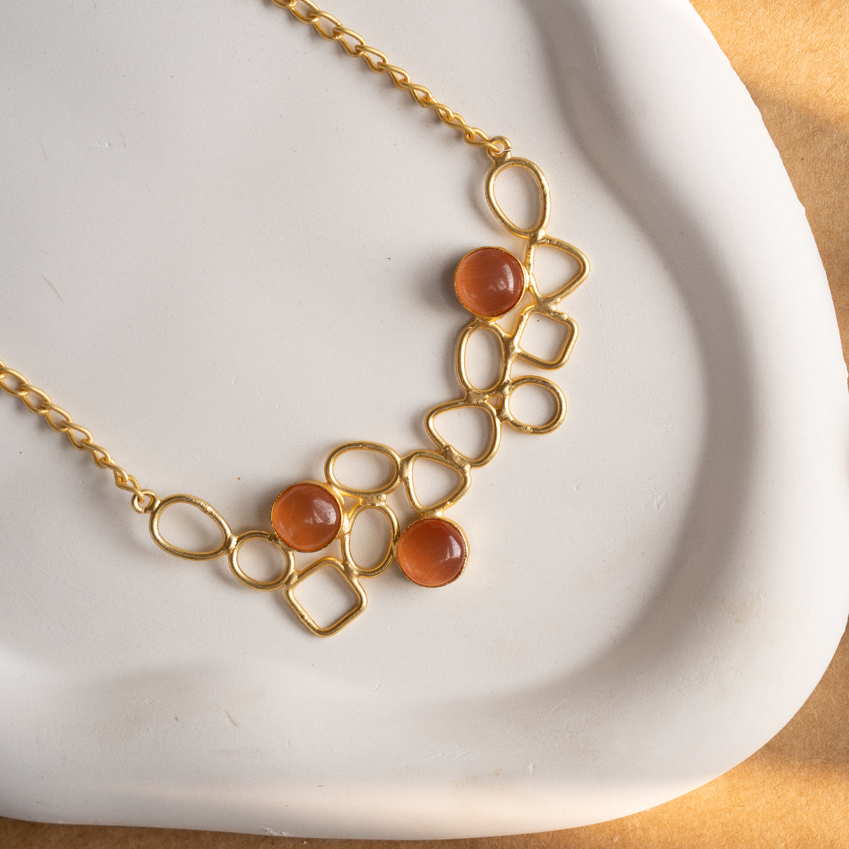 NIHARA GOLD TONED HANDMADE HAND HAMMERED NECKLACE WITH EARRINGS NL225