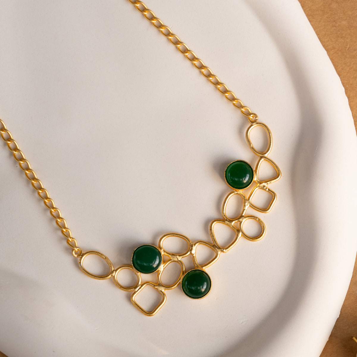 NIHARA GOLD TONED HANDMADE HAND HAMMERED NECKLACE WITH EARRINGS NL225