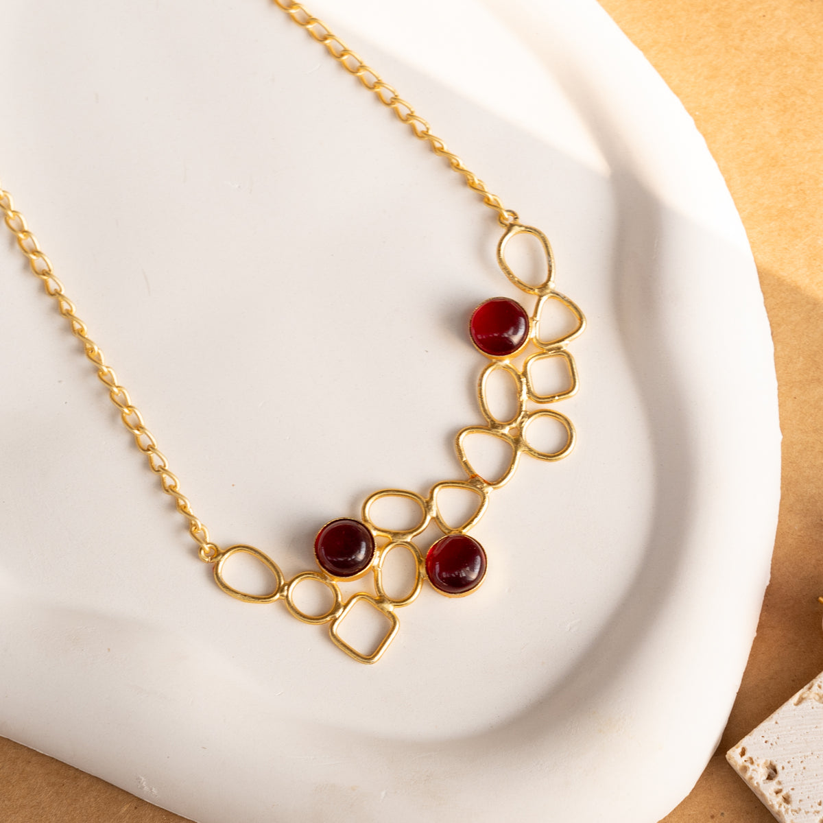 NIHARA GOLD TONED HANDMADE HAND HAMMERED NECKLACE WITH EARRINGS NL225