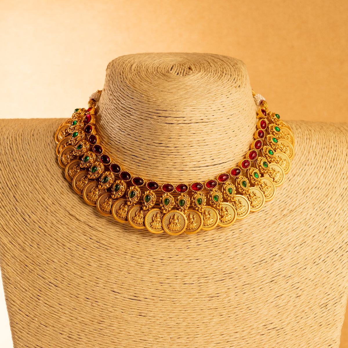 RITHIKA RUBY WITH GREEN GOLD TONED ANTIQUE FINISH TEMPLE NECKLACE WITH EARRINGS NL173