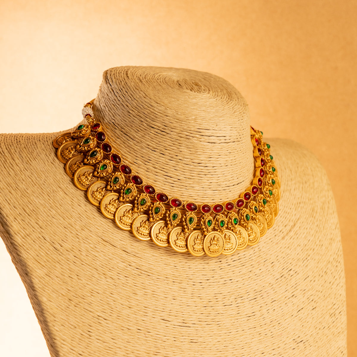 RITHIKA RUBY WITH GREEN GOLD TONED ANTIQUE FINISH TEMPLE NECKLACE WITH EARRINGS NL173