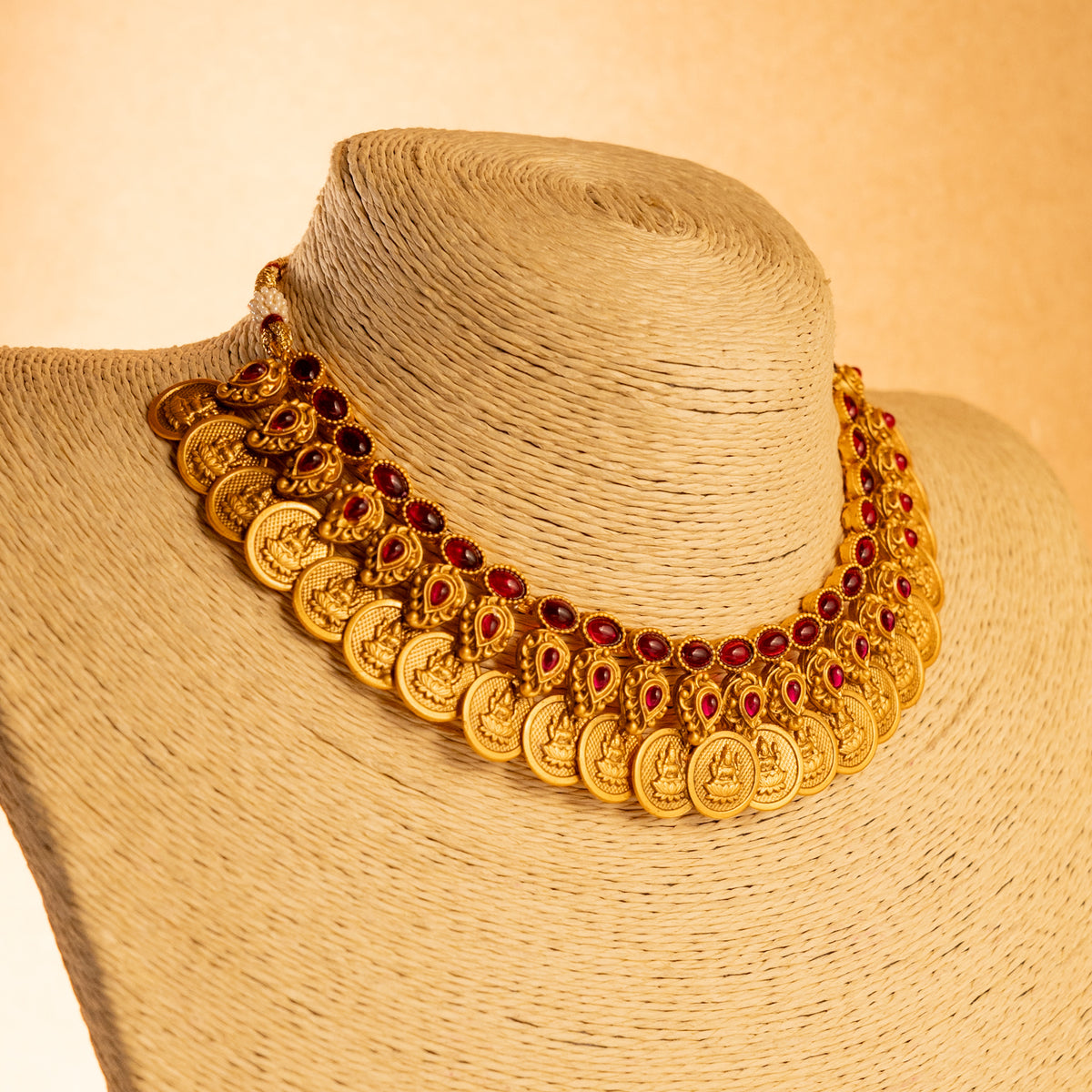 RITHIKA RUBY  GOLD TONED ANTIQUE FINISH TEMPLE NECKLACE WITH EARRINGS NL174