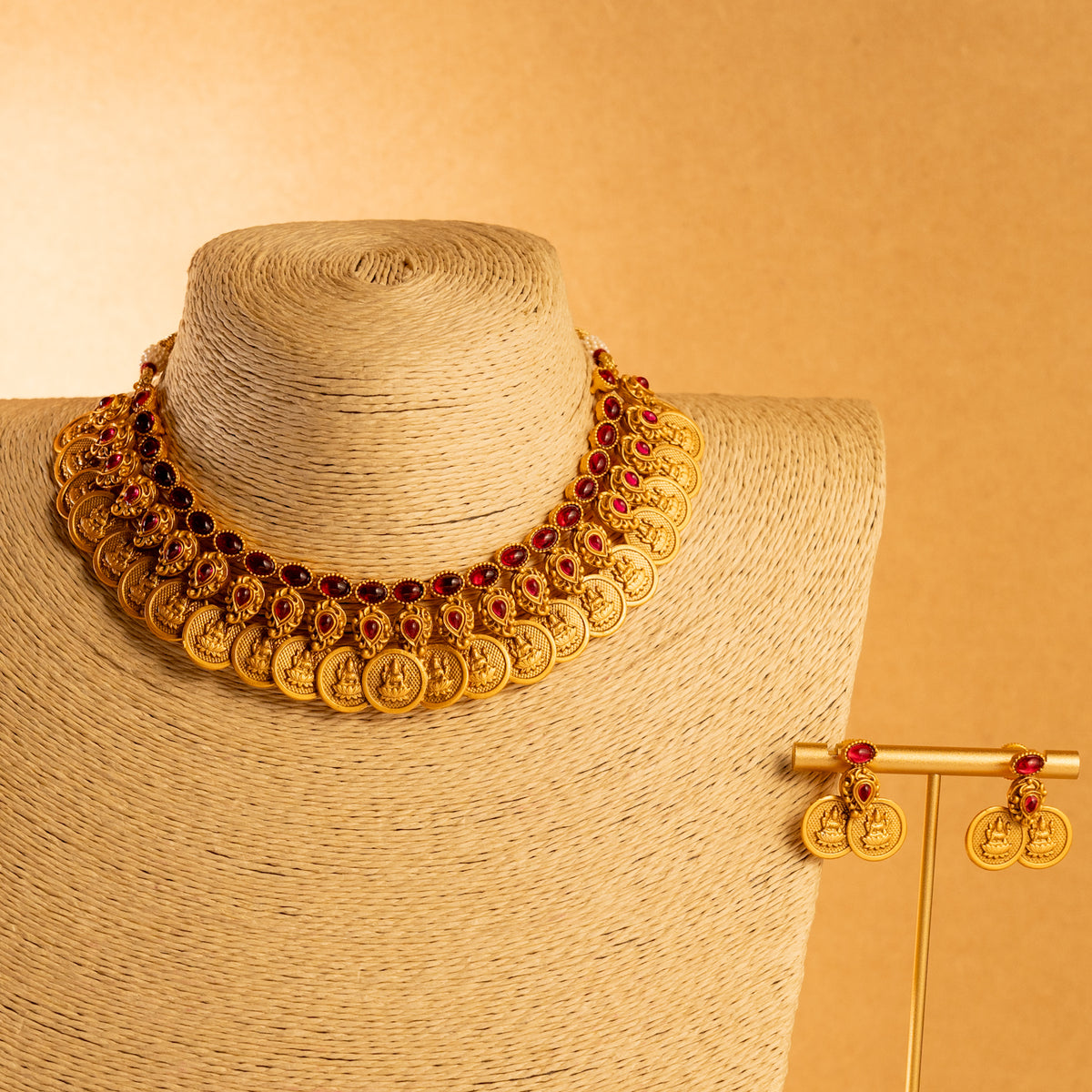 RITHIKA RUBY  GOLD TONED ANTIQUE FINISH TEMPLE NECKLACE WITH EARRINGS NL174