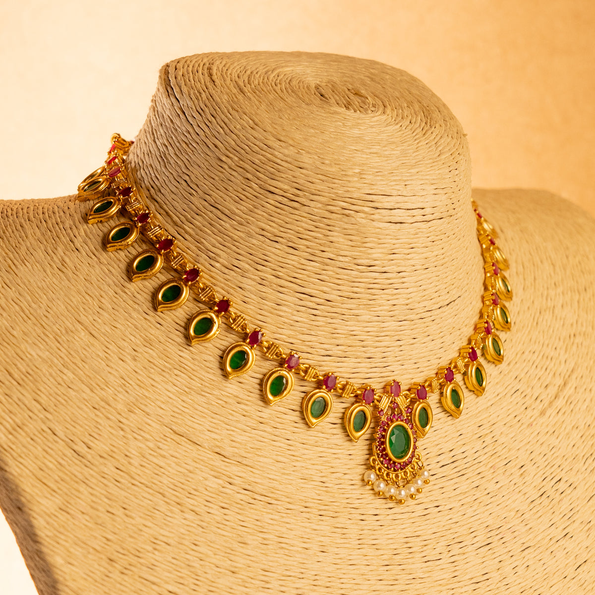 RADHA GOLD TONED ANTIQUE FINISH NECKLACE WITH EARRINGS NL169