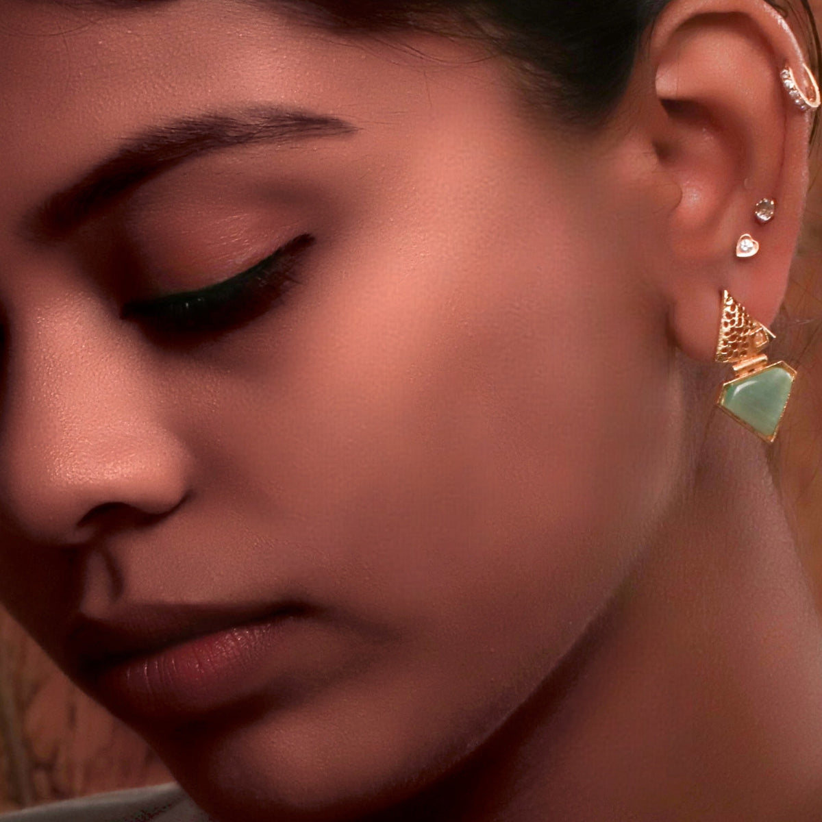 DIATANGLE GOLD TONED SEMI HANDMADE STUDS  ER208