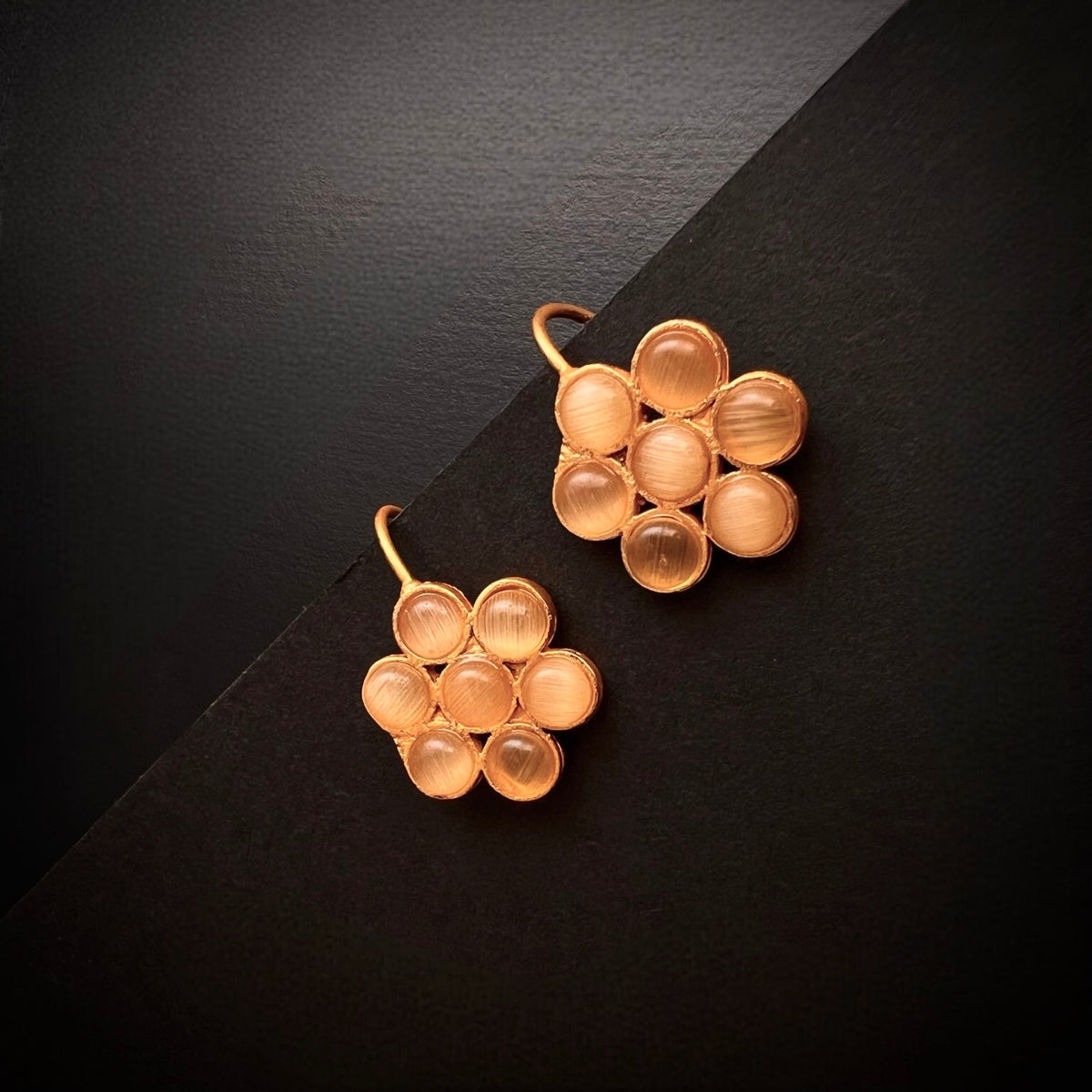 THILAMA FLORAL ANTIQUE GOLD TONED STUDS ER177