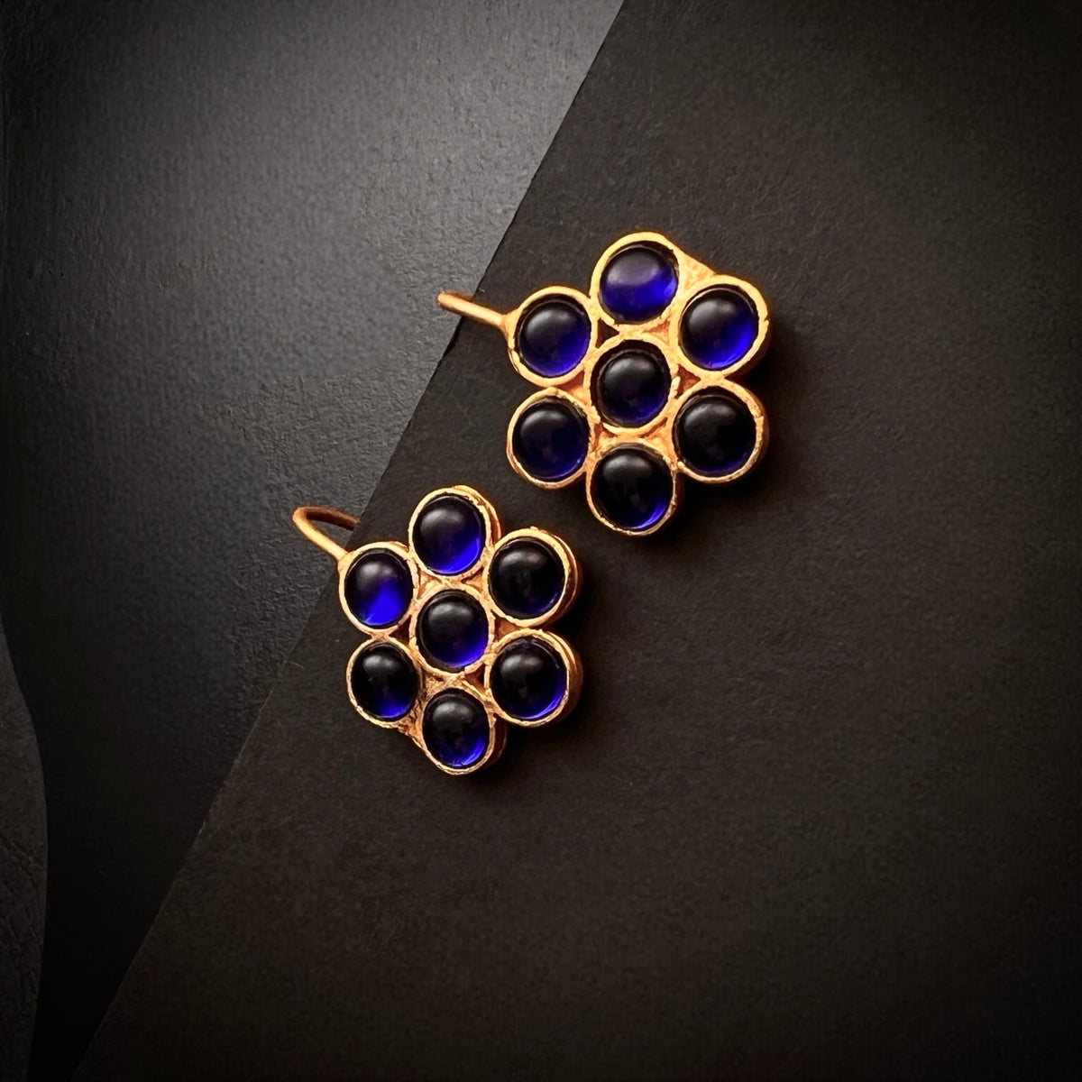 THILAMA FLORAL ANTIQUE GOLD TONED STUDS ER177