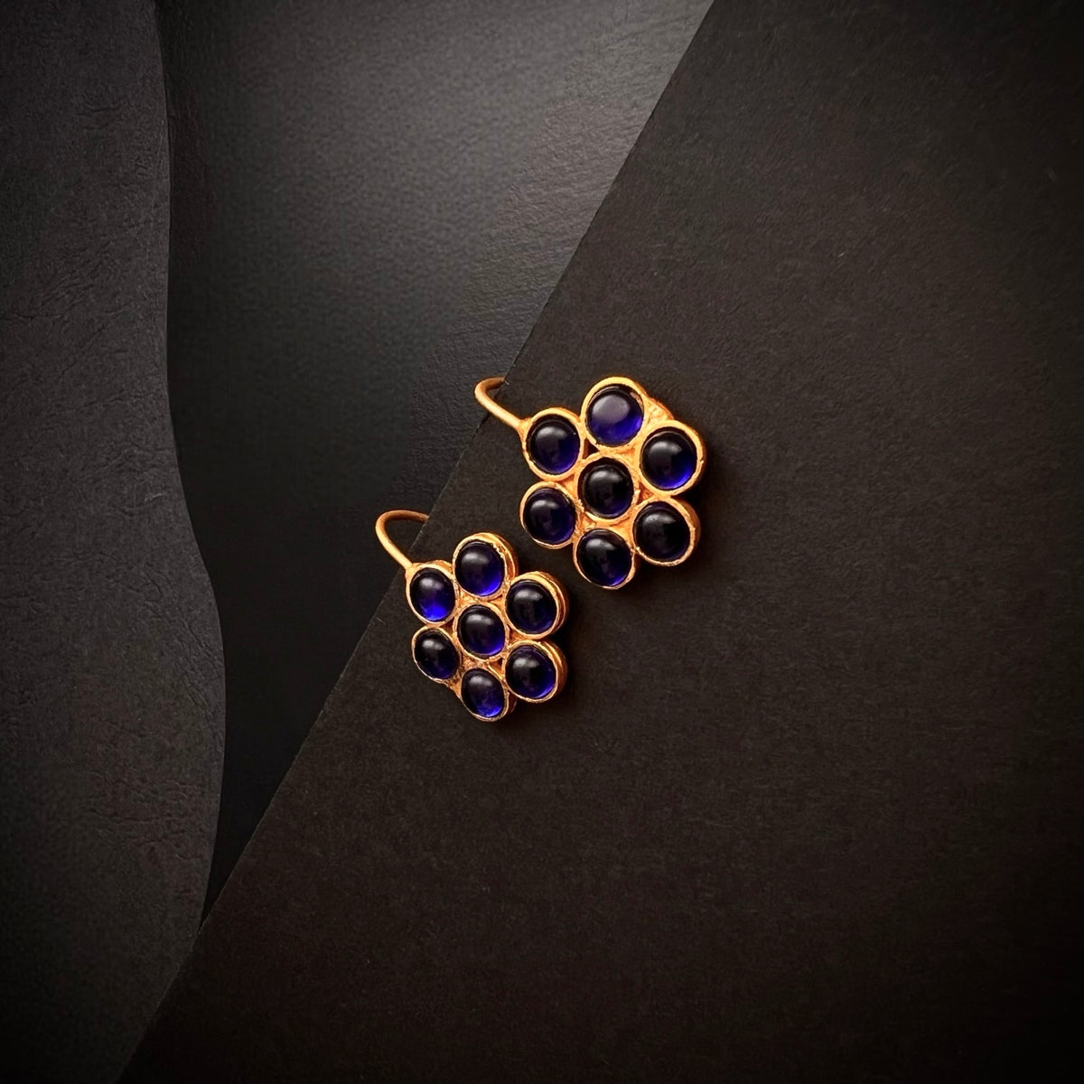 THILAMA FLORAL ANTIQUE GOLD TONED STUDS ER177