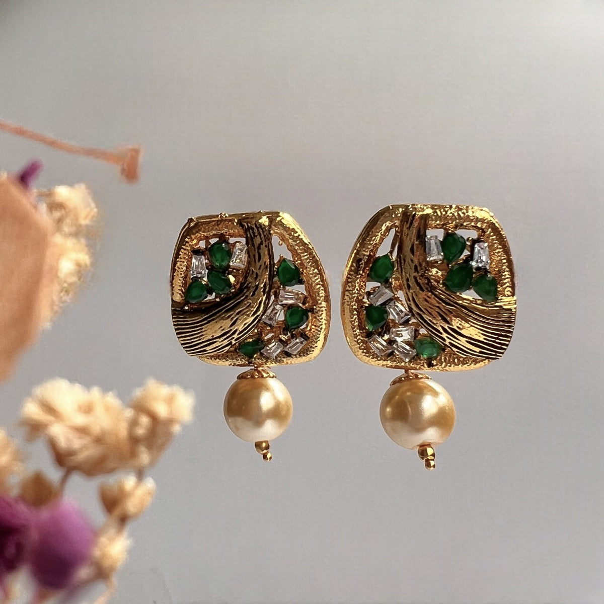 ROGINI  GOLD TONED AND ENAMELLED STUDS ER258
