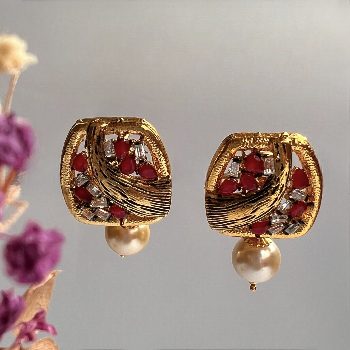 ROGINI  GOLD TONED AND ENAMELLED STUDS ER258
