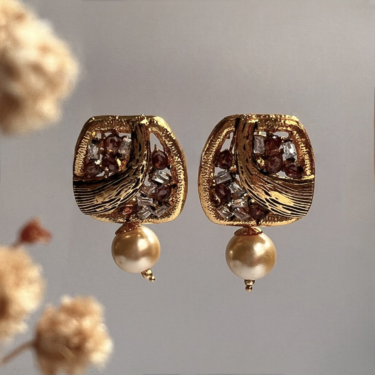 ROGINI  GOLD TONED AND ENAMELLED STUDS ER258