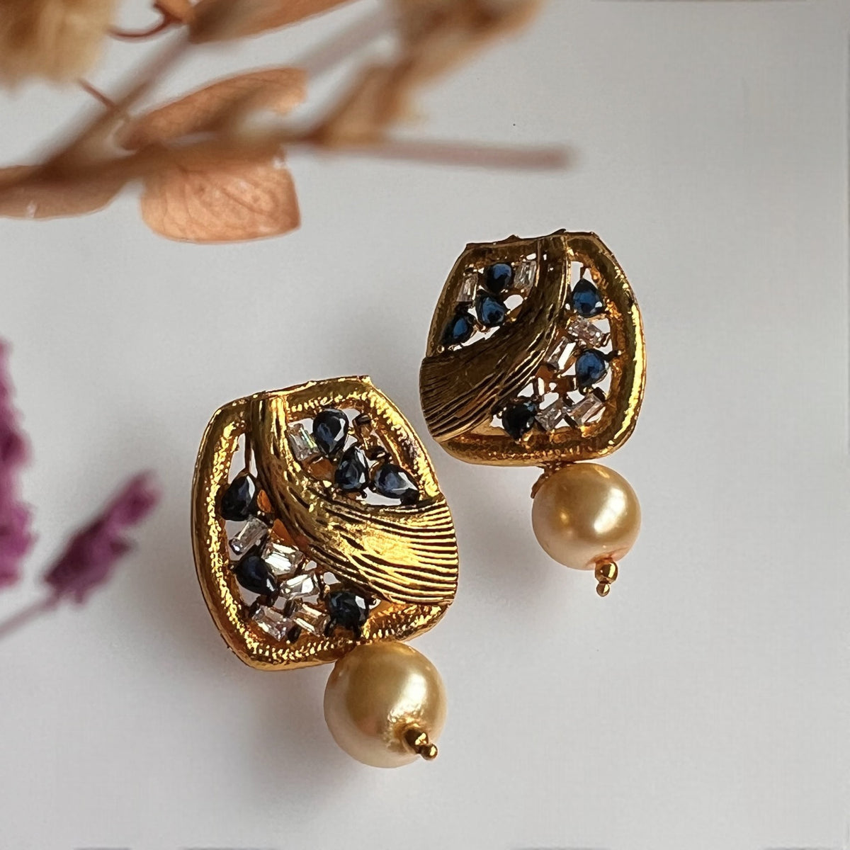 ROGINI  GOLD TONED AND ENAMELLED STUDS ER258