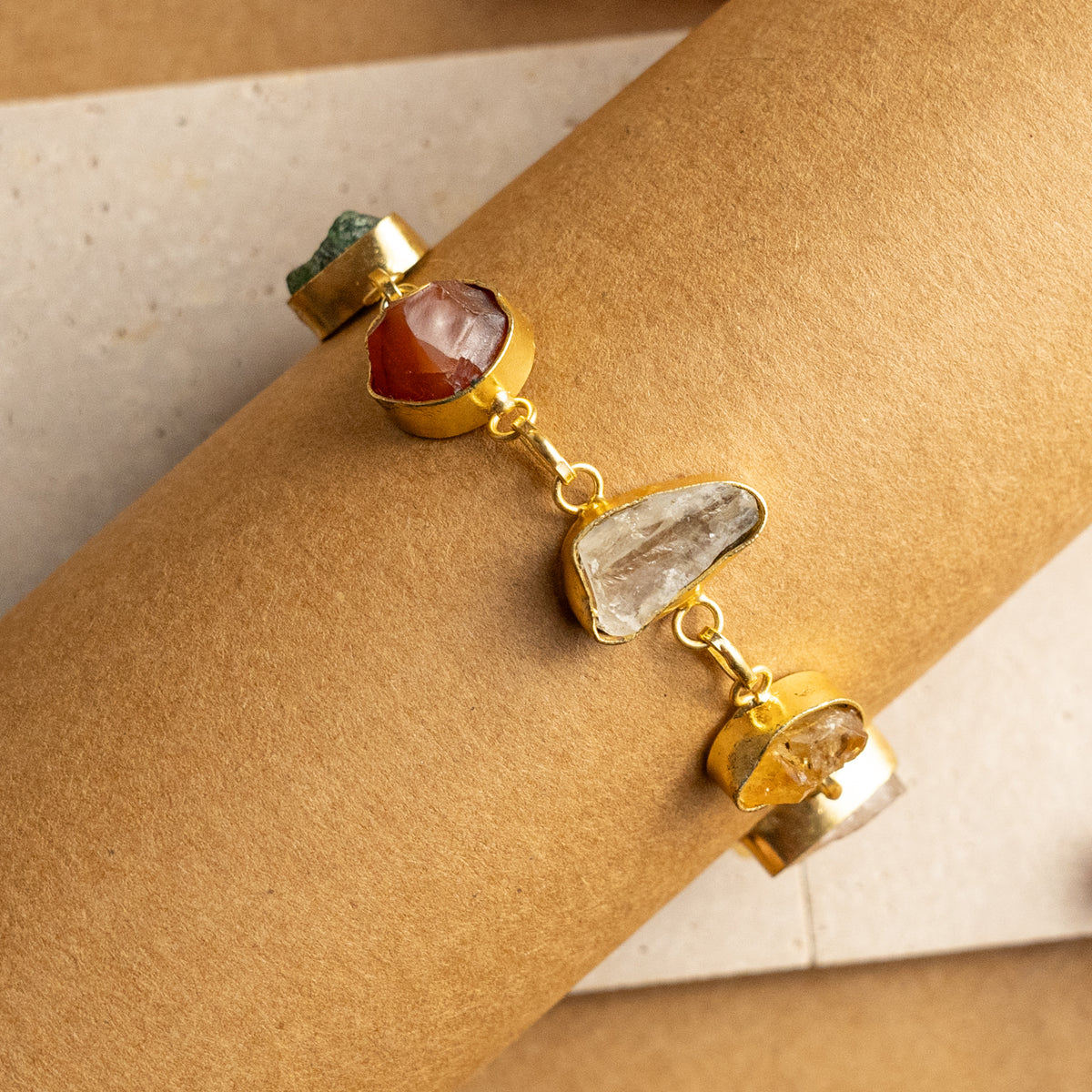 HIRANYA HAND HAMMERED AND HANDMADE GOLD TONED RAW STONE CLASSIC BRACELET BR27