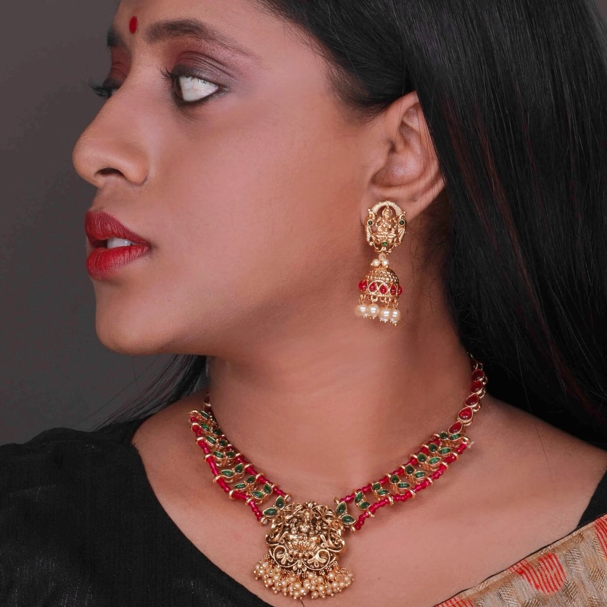 LAKSHMI GOLD TONED ANTIQUE FINISH TEMPLE NECKLACE WITH EARRINGS NL185