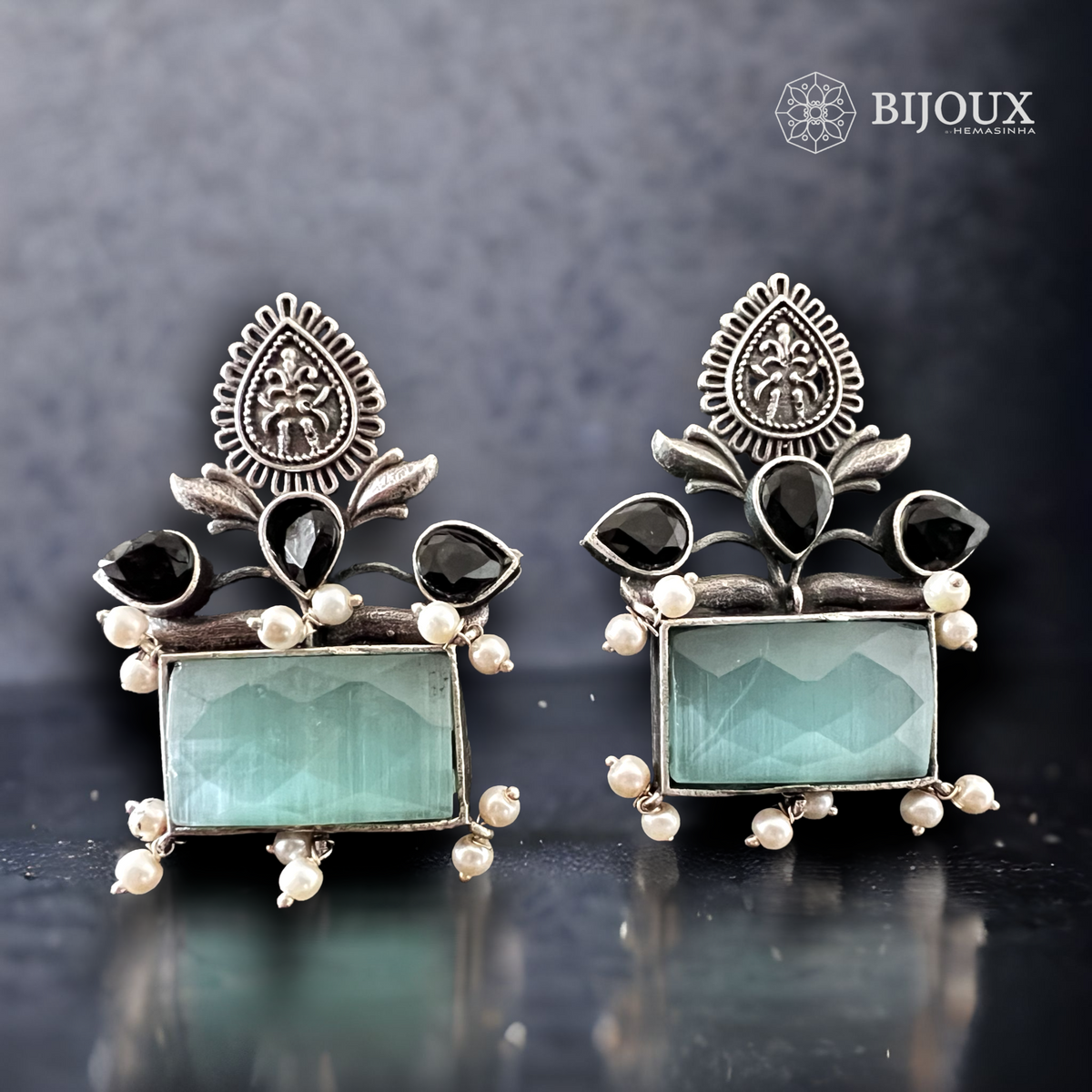 FOLIAGE SQUARE SILVER LOOK ALIKE STUDS ER262