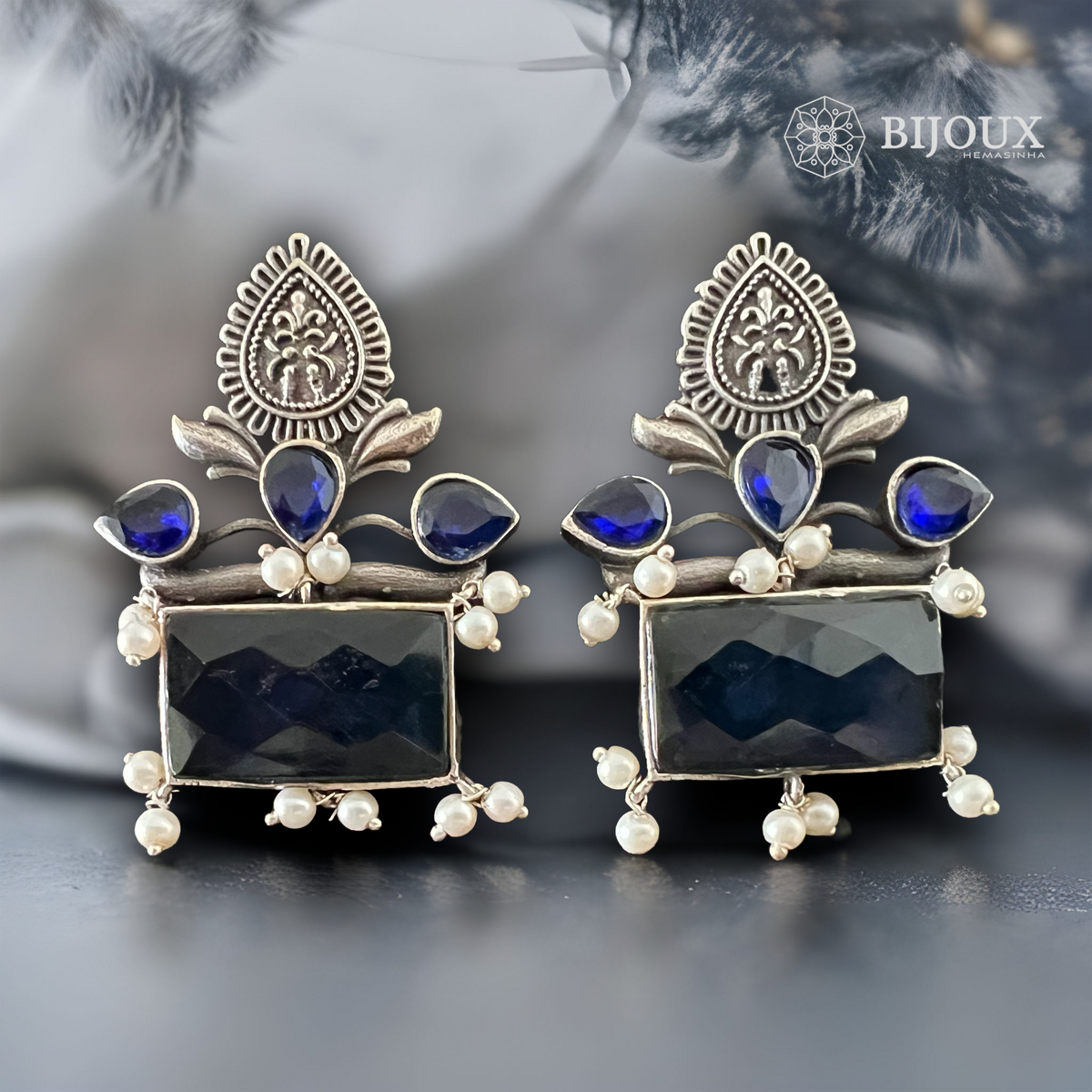 FOLIAGE SQUARE SILVER LOOK ALIKE STUDS ER262