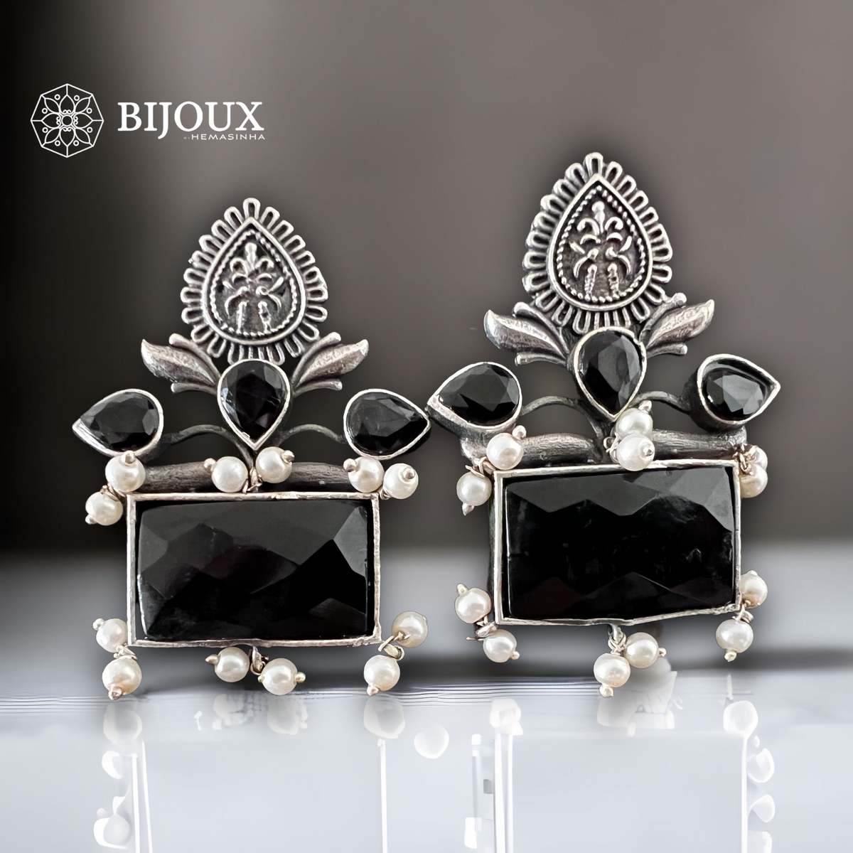 FOLIAGE SQUARE SILVER LOOK ALIKE STUDS ER262