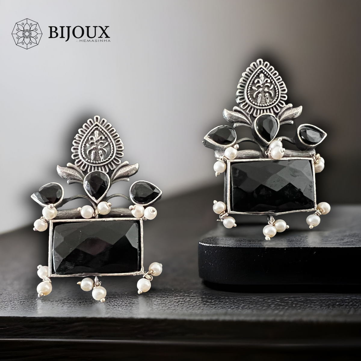 FOLIAGE SQUARE SILVER LOOK ALIKE STUDS ER262