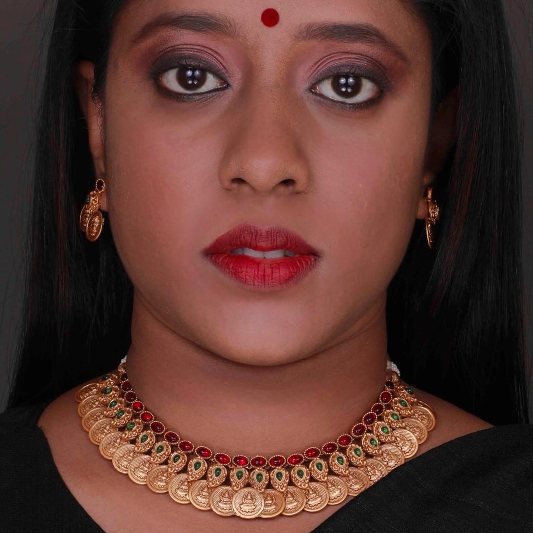 RITHIKA RUBY  GOLD TONED ANTIQUE FINISH TEMPLE NECKLACE WITH EARRINGS NL174